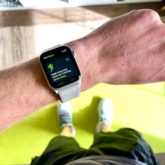 Fitness watch on a wrist for the workout tracker